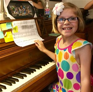 Chloe during piano lesson!